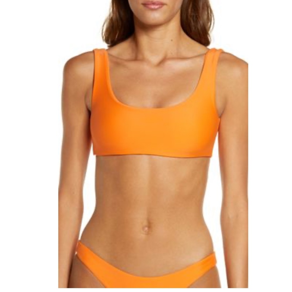 NWOT! Jade Swim rounded edges top in orange. Sz S